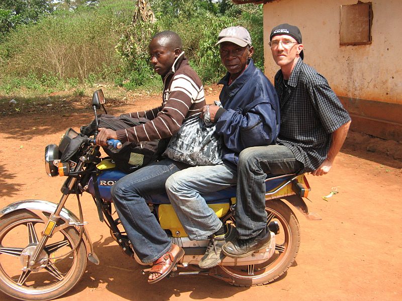 three-on-motorbike with anthropologist